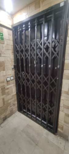 درب حفاظ آکاردیونی تسمه دو نیم پرچ مخفی